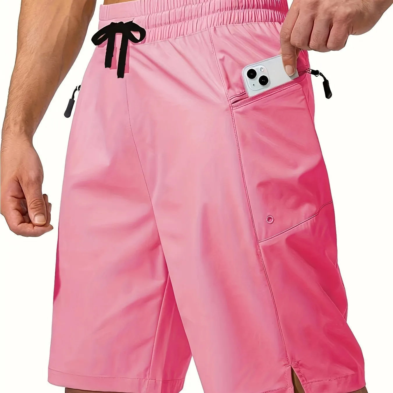 Men's solid colour quick-drying beach shorts in polyester fabric showing straight-leg cut