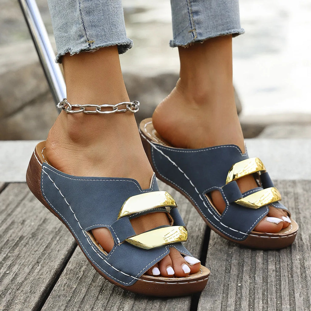 Roman style platform flip-flops in black, white, khaki, or sea blue with a rubber sole.