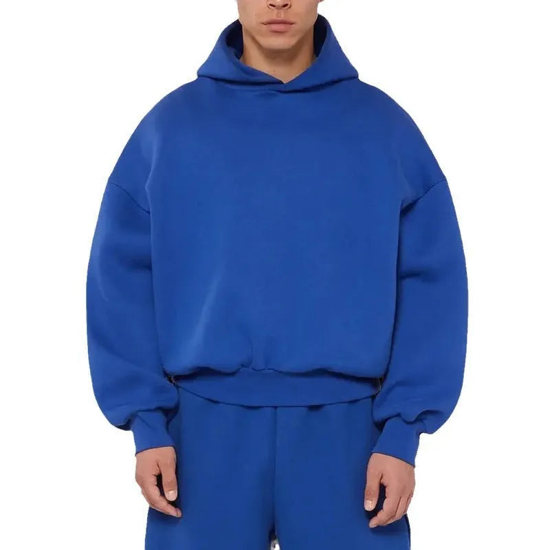 Men's solid color fleece-lined pullover hoodie with threaded long sleeves in gray, black, blue, or red.