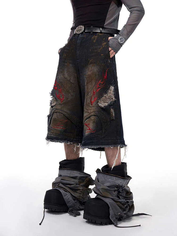 Men's wide-leg retro denim jeans with detachable trouser legs in a loose fit with a mid-high waist.