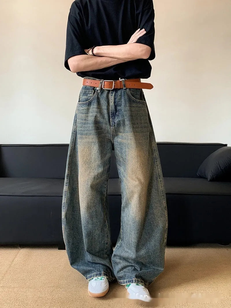 Men's retro blue distressed slim-fit wide-leg jeans on a model