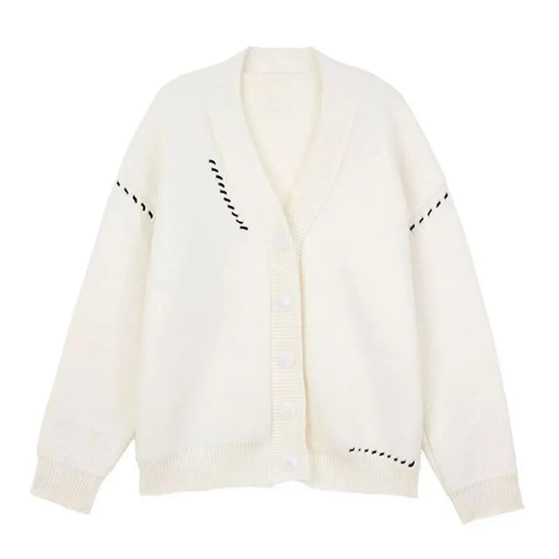 Women's loose knitted cardigan coat in solid white or black colour with long sleeves
