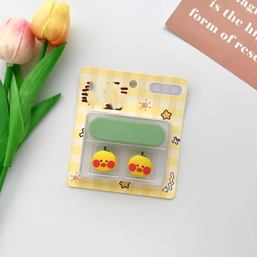 Colourful cartoon-style plastic fixer for organising a magnetic data cable on a desktop
