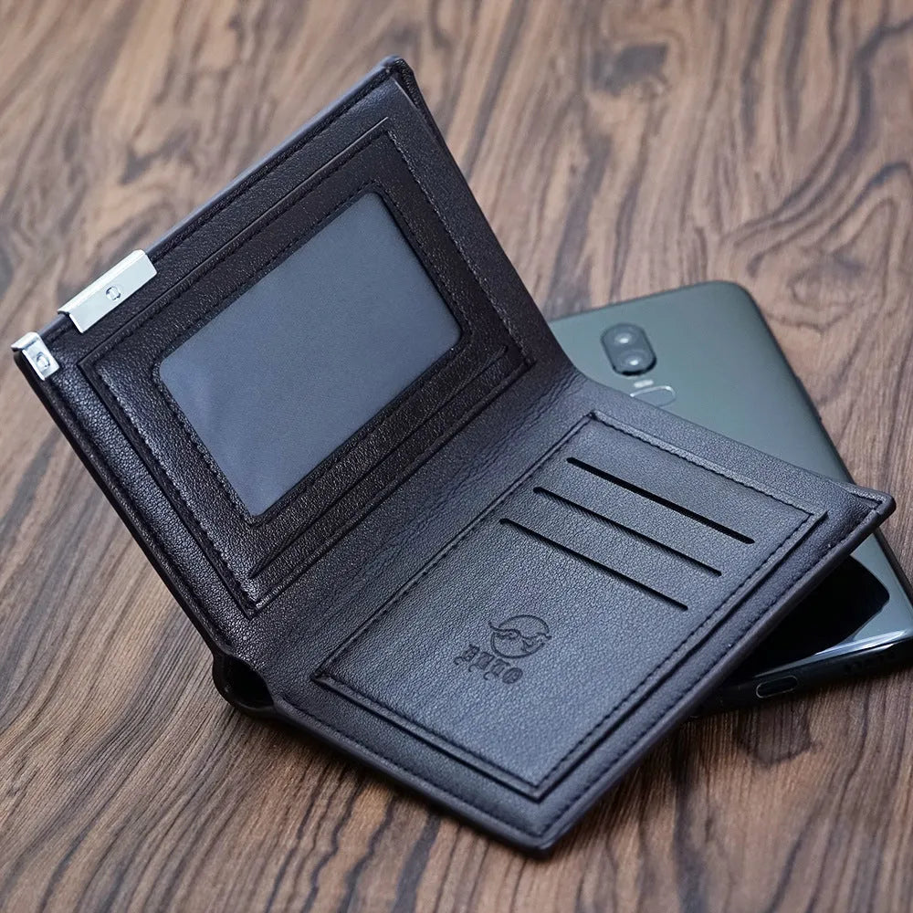 Men's brown leather wallet with a silver zipper closure laid flat.