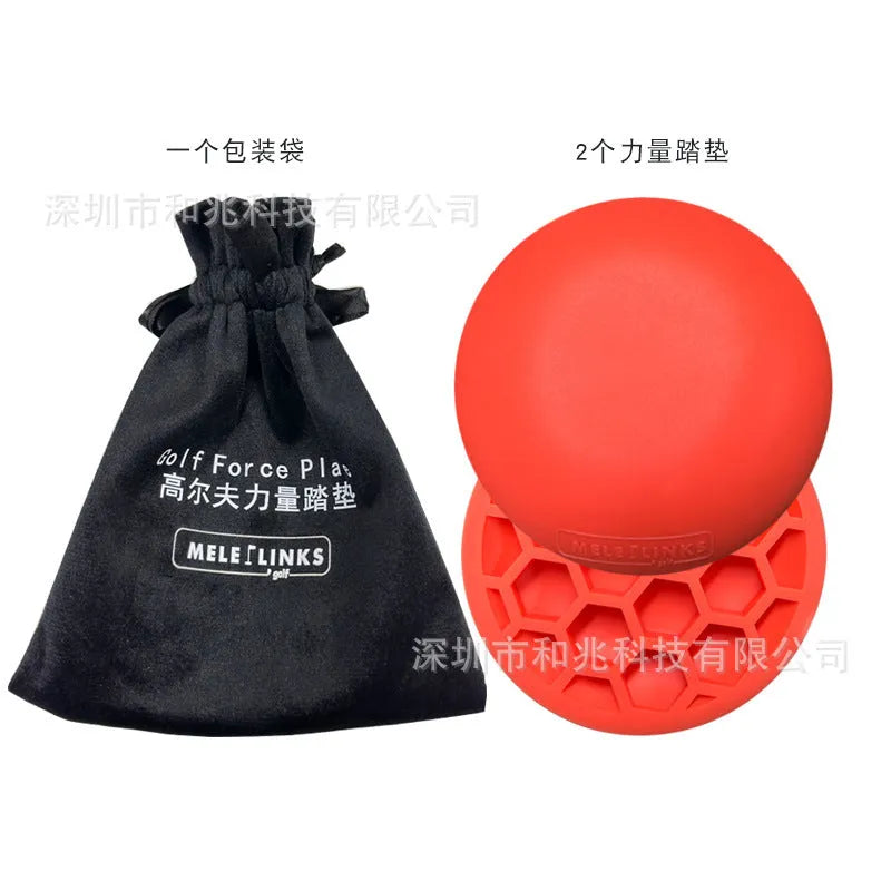 Orange-red golf training mat with weighted centre for swing practice