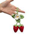 Handmade knitted strawberry shaped car hanging ornament made from cotton and hemp fibres