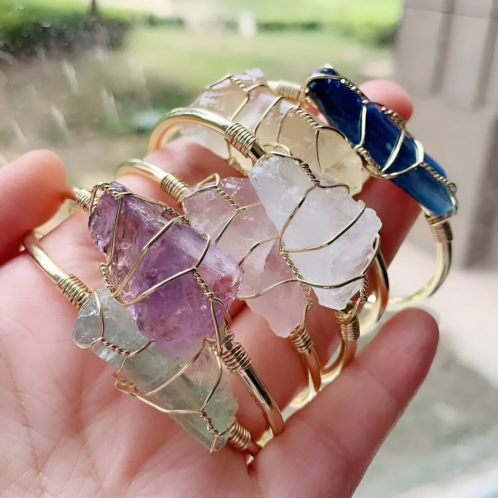 Natural rough crystal stone bracelet with geometric gold tone metal winding, bohemian style.