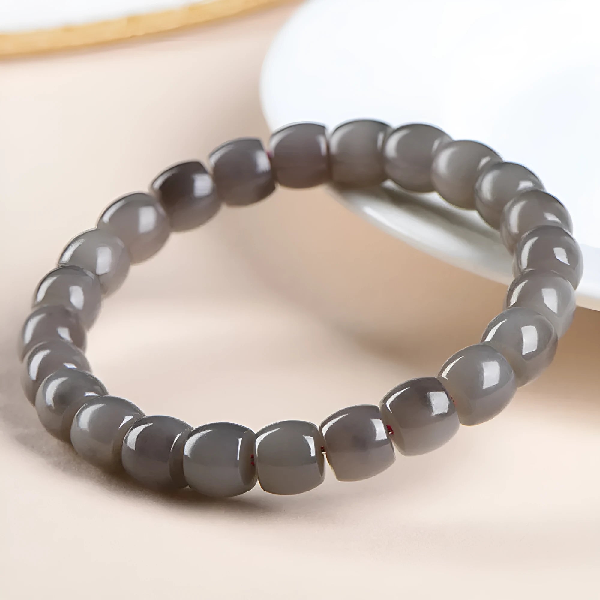 Natural Smokey Violet Hetian jade straight cut bracelet with 8x9mm beads.