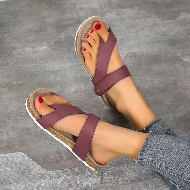 Flat toe ring thick-soled flip-flops in a solid colour on a foam sole.