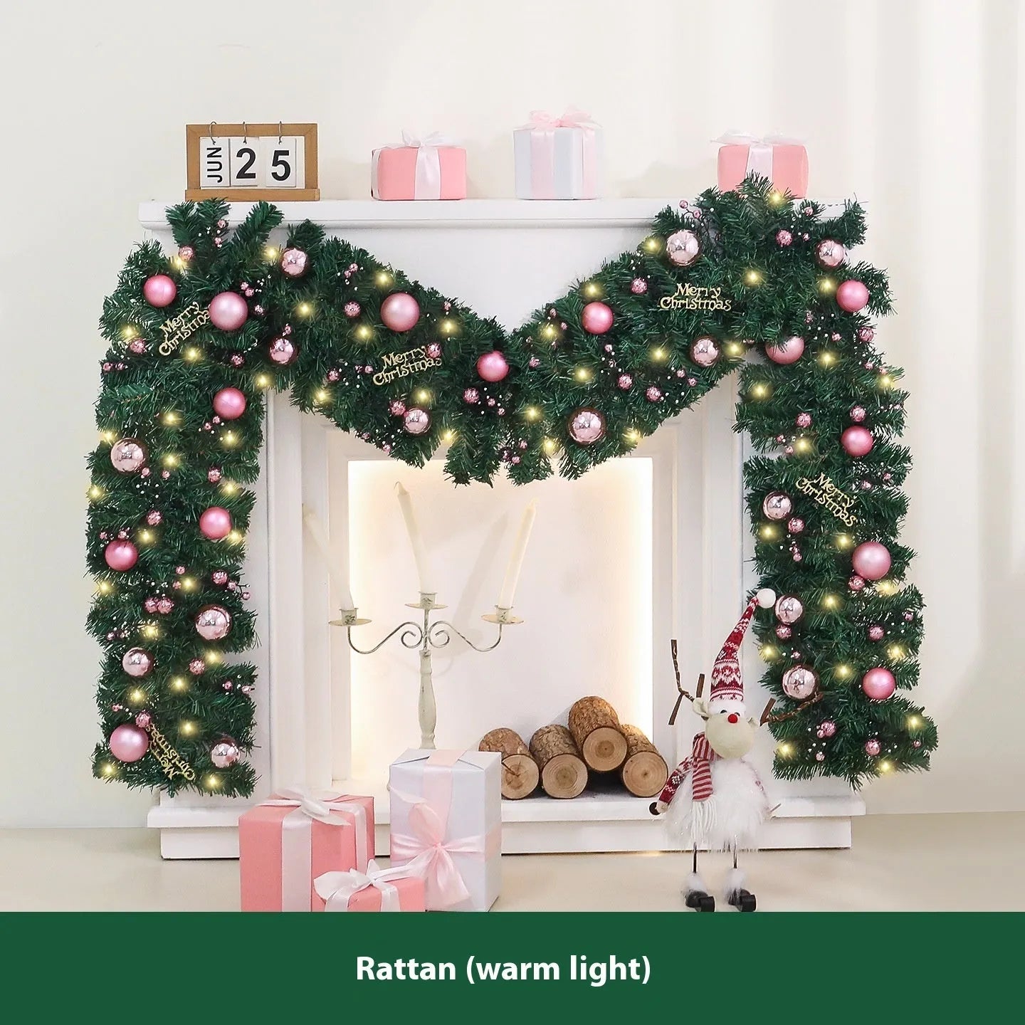 2.7 metre pink small fruit Christmas rattan garland with wrought iron frame draped along wall