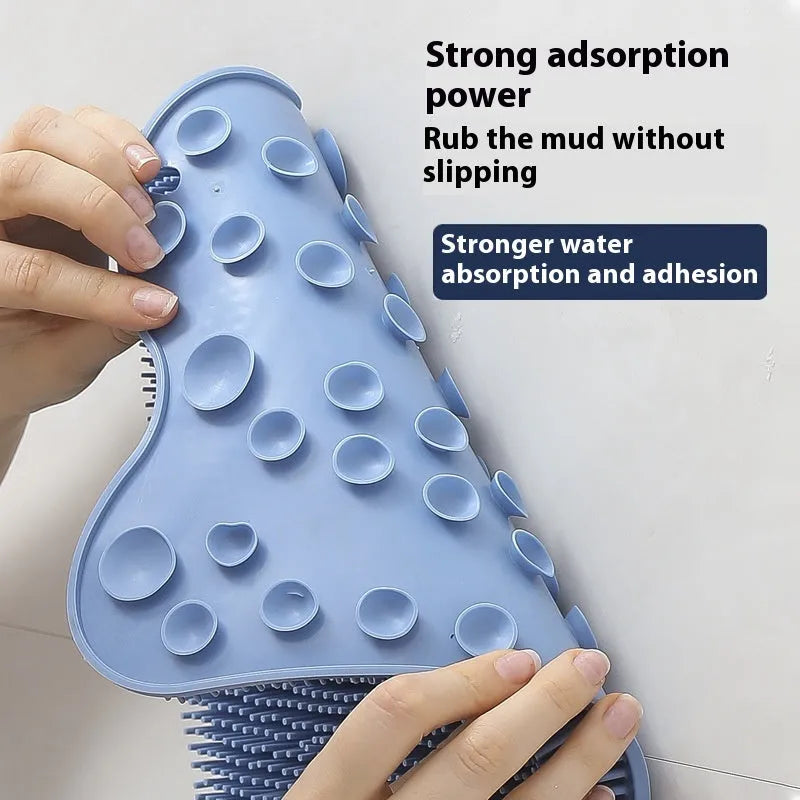 Blue silicone bath scrubber mat with bristles, shown next to grey and pink colour options.