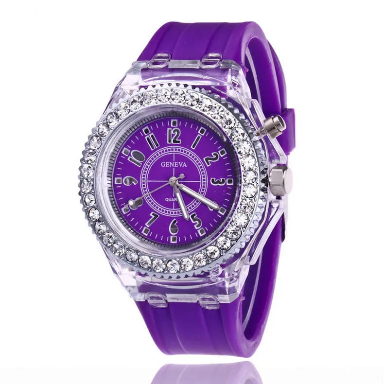 Women's LED luminous quartz watch with round 43mm alloy case and colourful silicone strap options.
