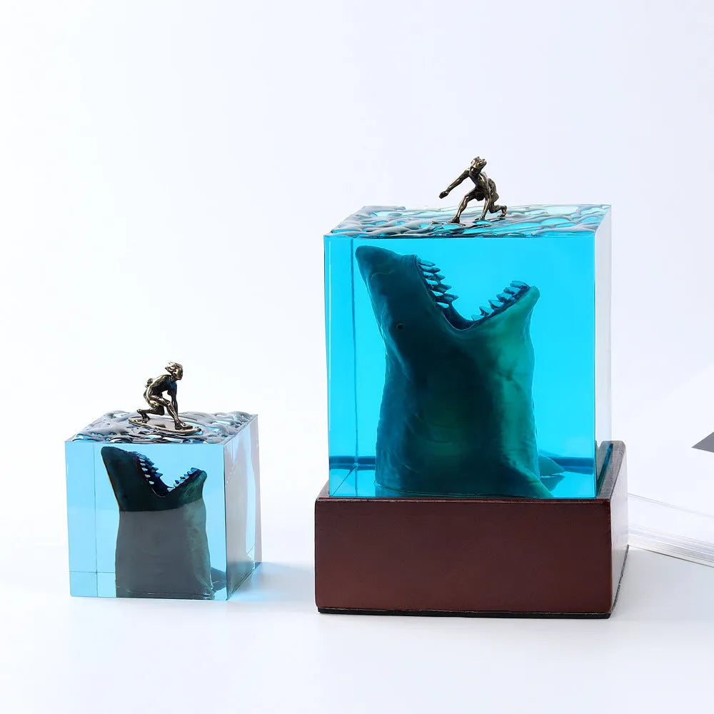 Epoxy resin shark surfer night light ornament on a desk, showing 5cm and 8cm size options.