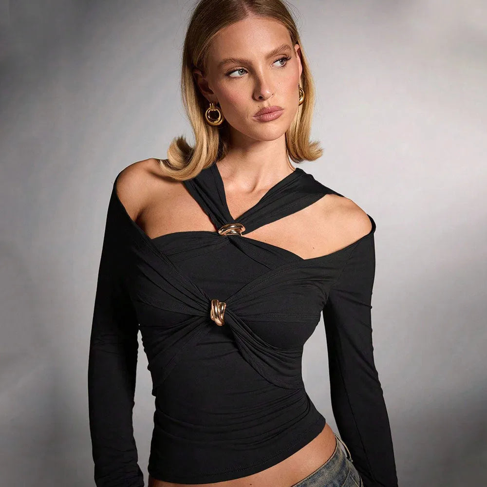 Black women's halter neck long sleeve slim fit top on a hanger.