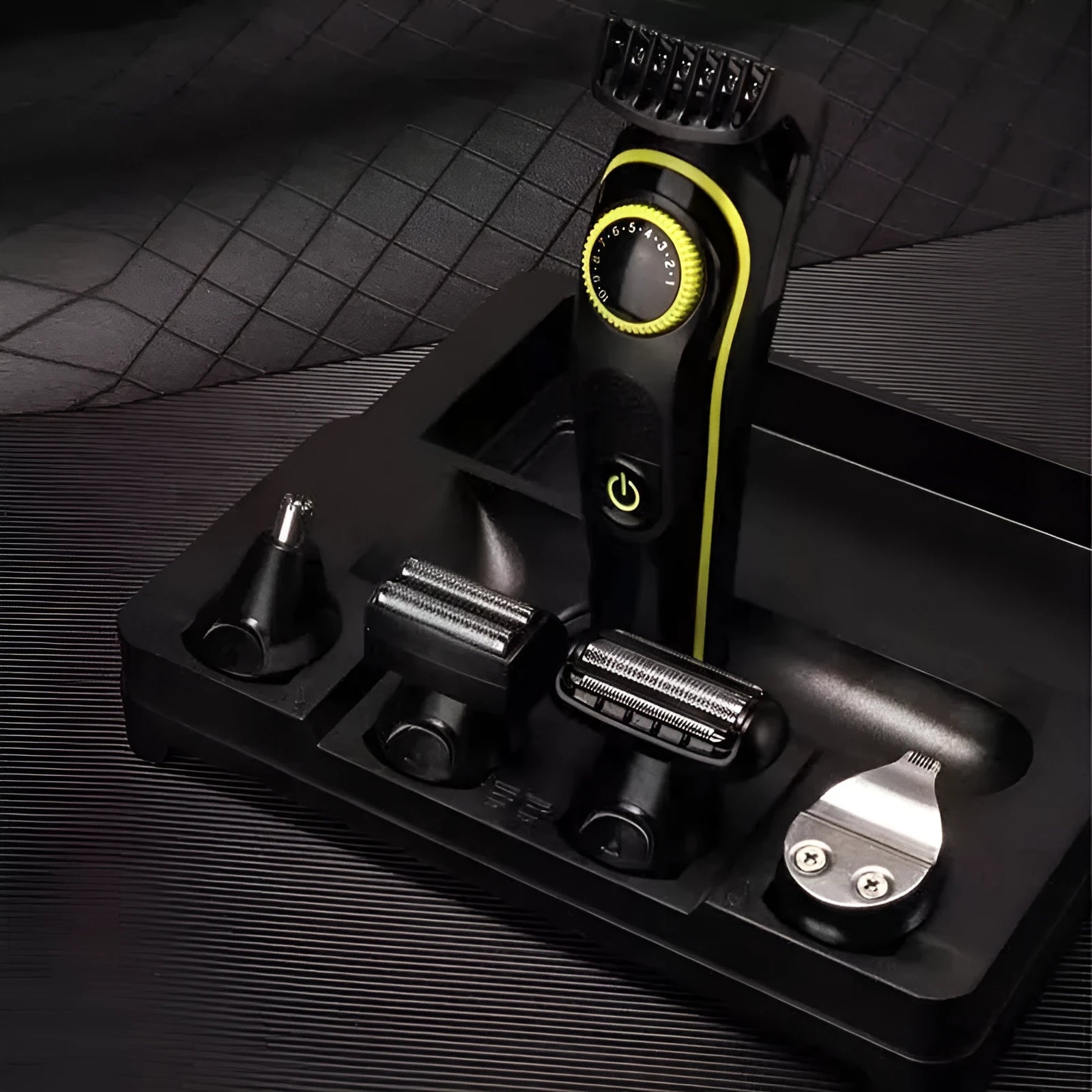 Black KM-696 rechargeable electric hair clipper kit with stainless steel blade and USB charging cable