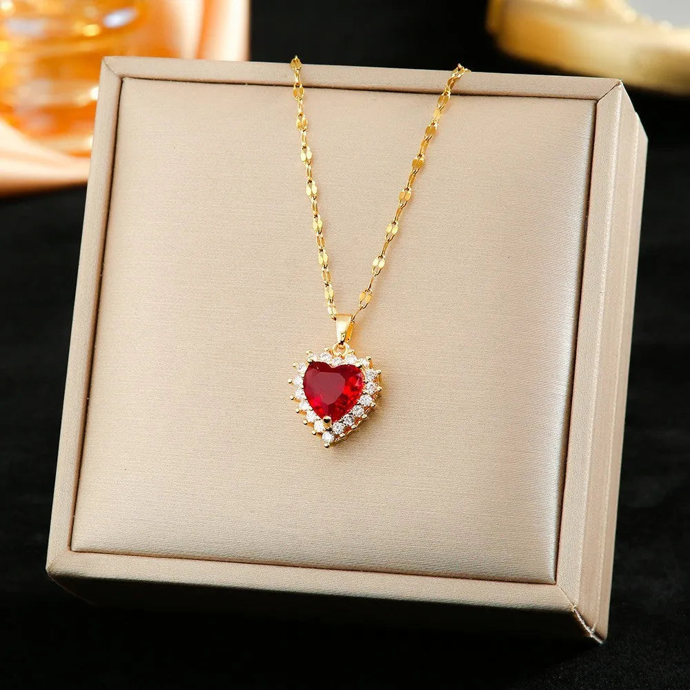 Gold red heart jewellery suit with mixed gem inlays on titanium steel necklace, earrings and ring