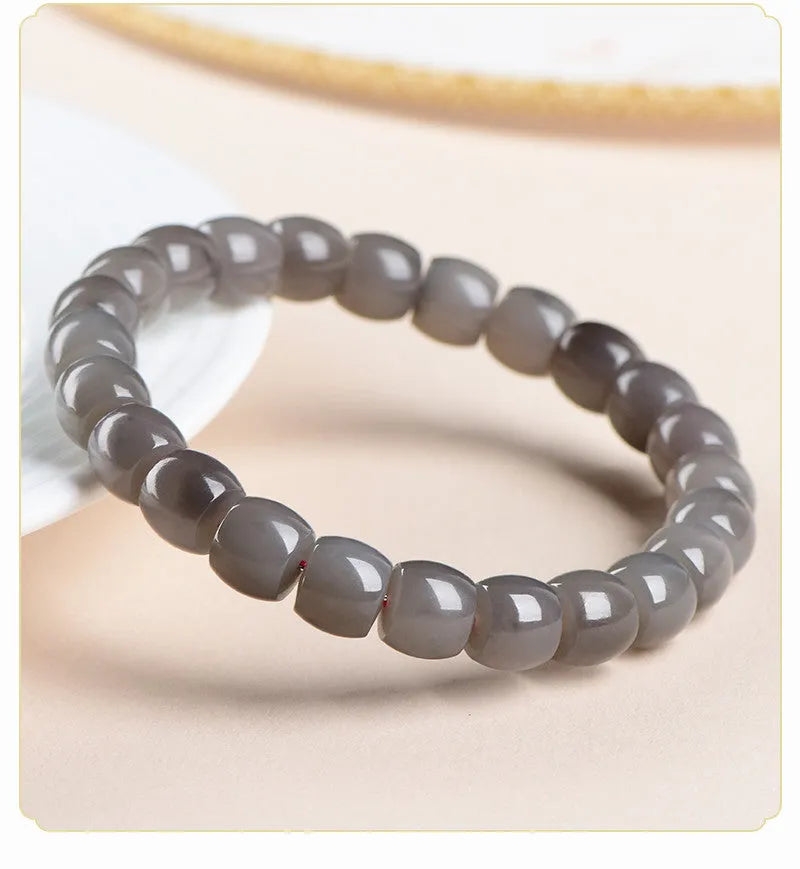 Natural Smokey Violet Hetian jade straight cut bracelet with 8x9mm beads.