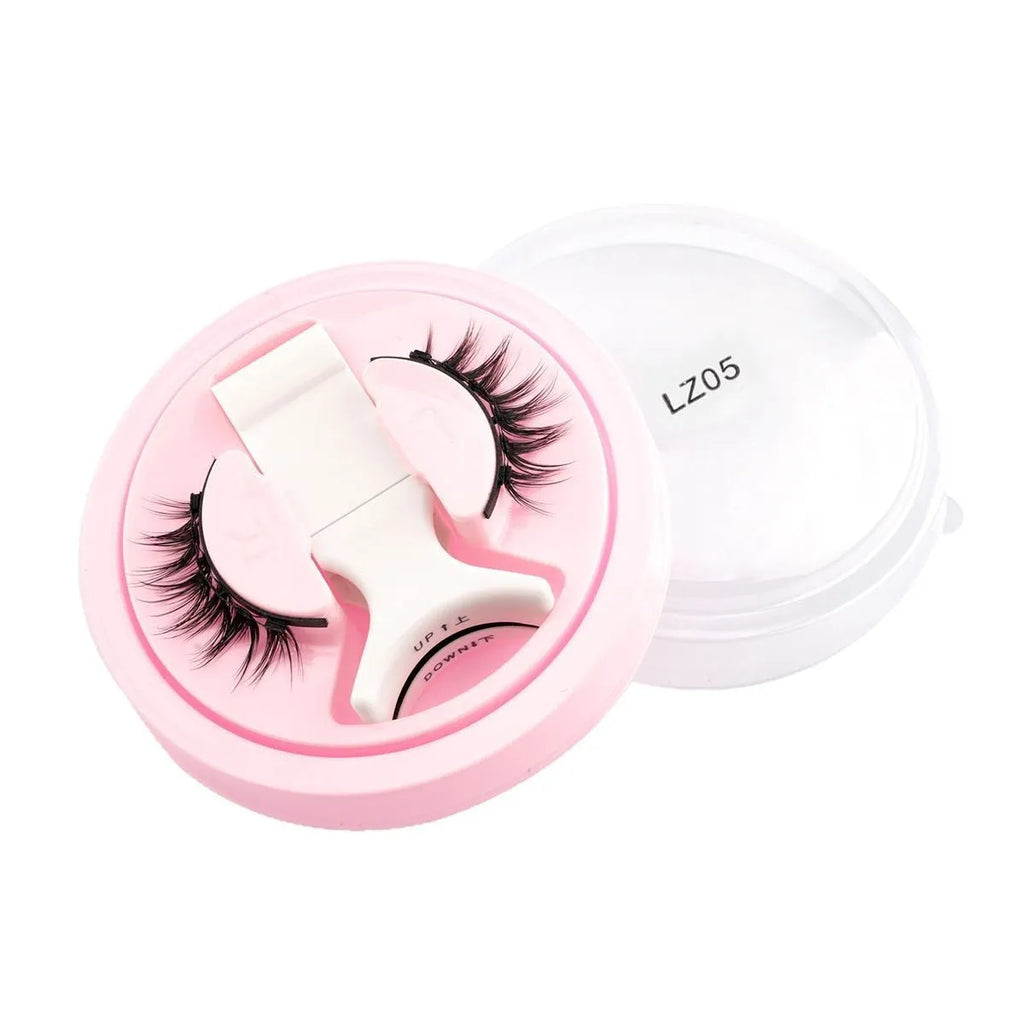 Reusable waterproof false eyelashes in a set, showing thick artificial fibre lashes.