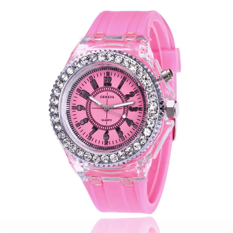 Women's LED luminous quartz watch with round 43mm alloy case and colourful silicone strap options.