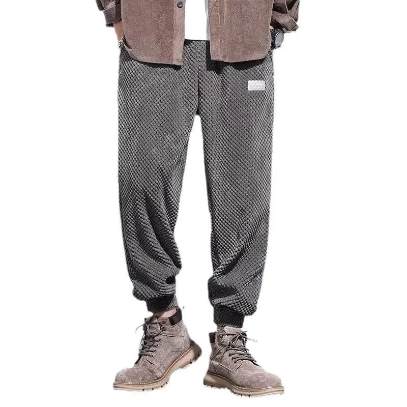 Men's grey ankle-tied sweatpants with straight leg cut and adjustable cuff ties