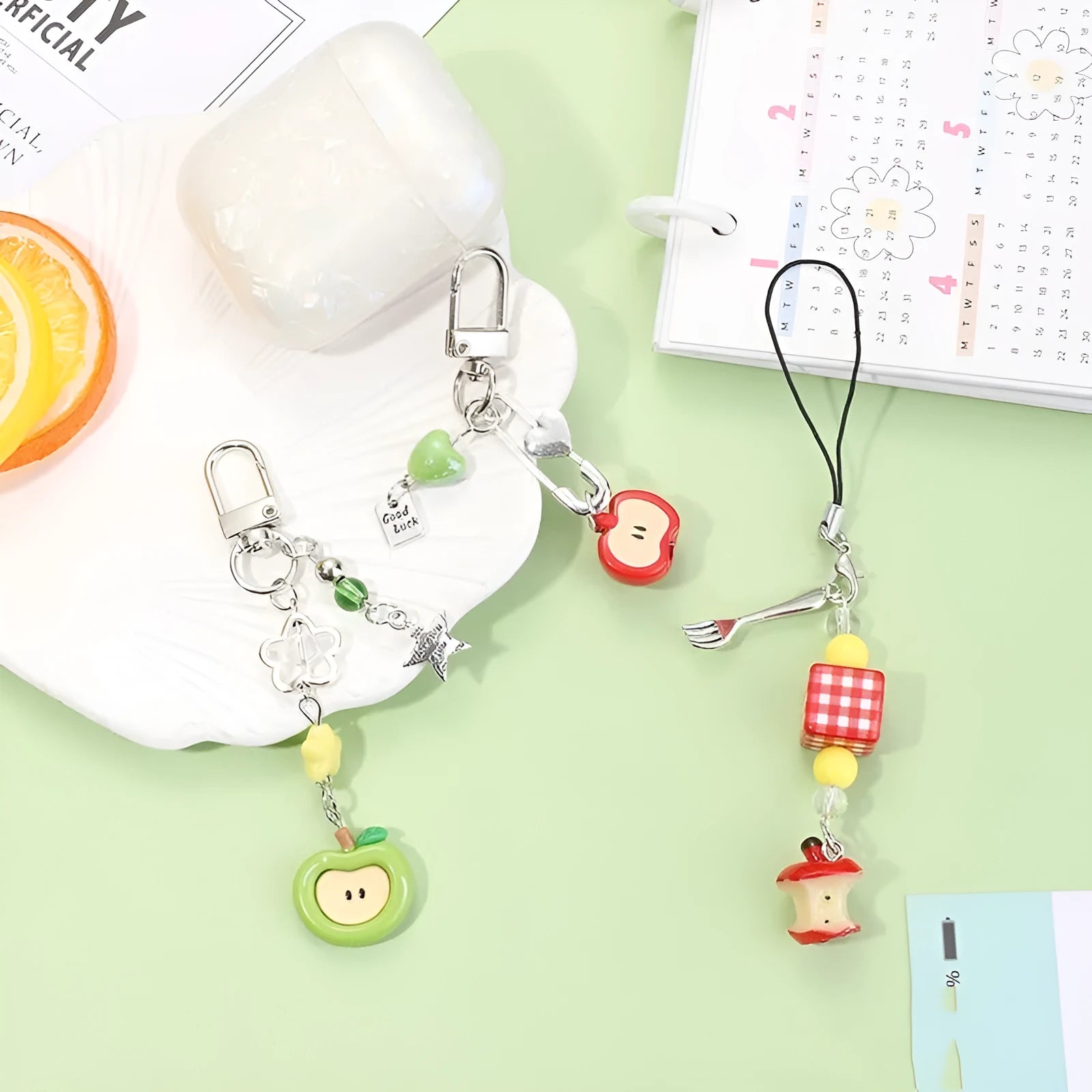 Plastic resin mobile phone charm keychain with fruit patterns including apple and strawberry designs