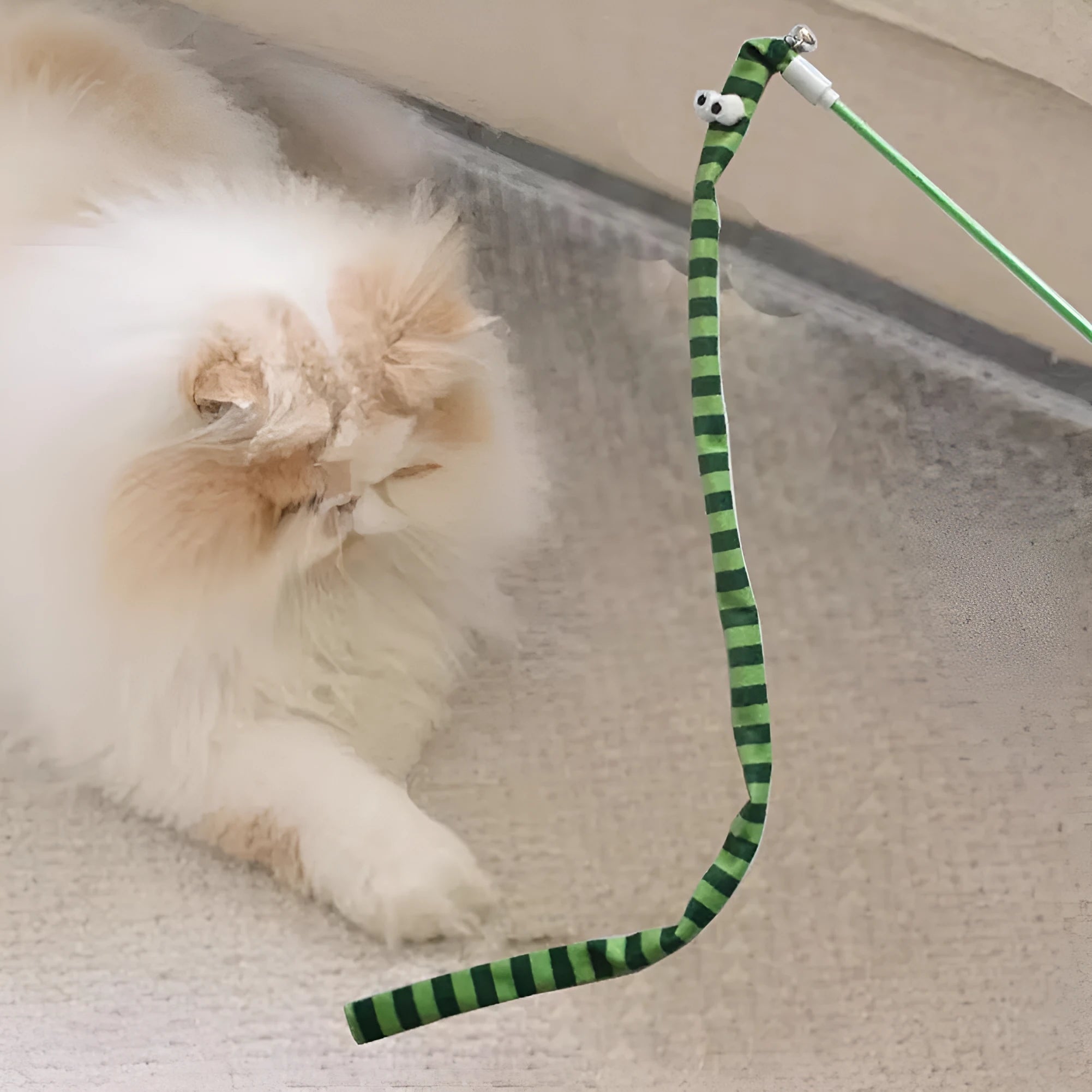 Green cat wand toy with long plush strip on a polycarbonate pole