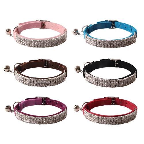 Soft pink flocking cat collar with silver elastic buckle, shown adjusted to fit.