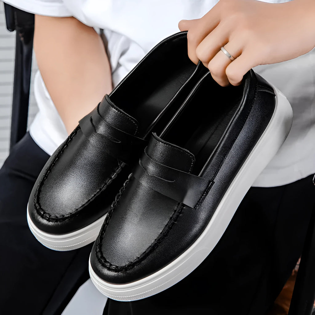 PU leather casual slip-on shoes in round toe design available in white, black and white, and khaki colour options