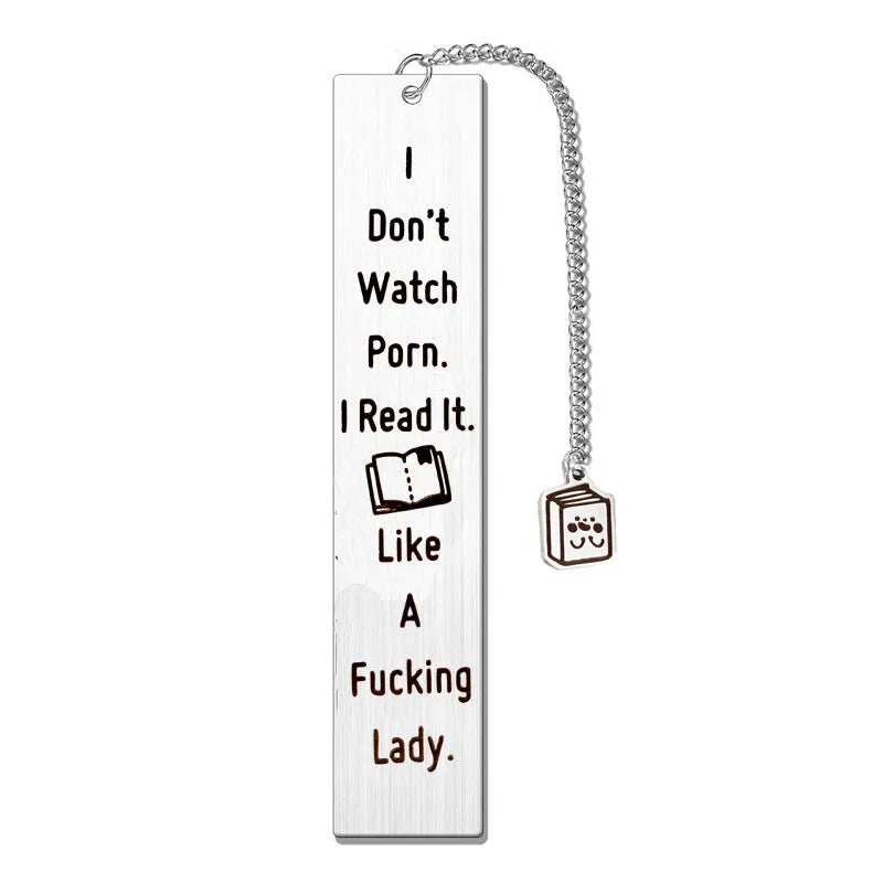 Stainless steel tassel-style bookmark with engraved 'reading enthusiasts literary' text on a metal surface.