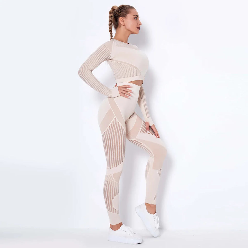 Woman wearing a long-sleeved seamless knitted yoga wearsuit in a stripe pattern, demonstrating a yoga pose.
