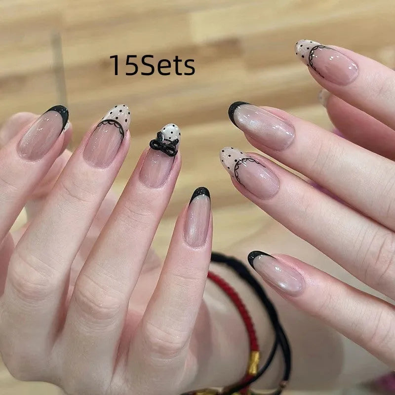 False nails sets for girls showing floral and glitter designs on short oval and stiletto nail shapes
