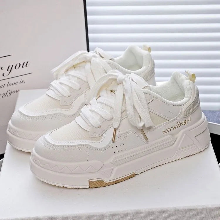 Children's beige board shoes with thick rubber sole, lace-up front, and cross shoulder straps