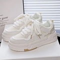 Children's beige board shoes with thick rubber sole, lace-up front, and cross shoulder straps