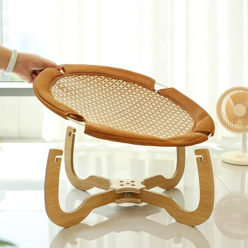 Brown woven rattan pet hammock bed measuring 46cm square with 17.5cm height