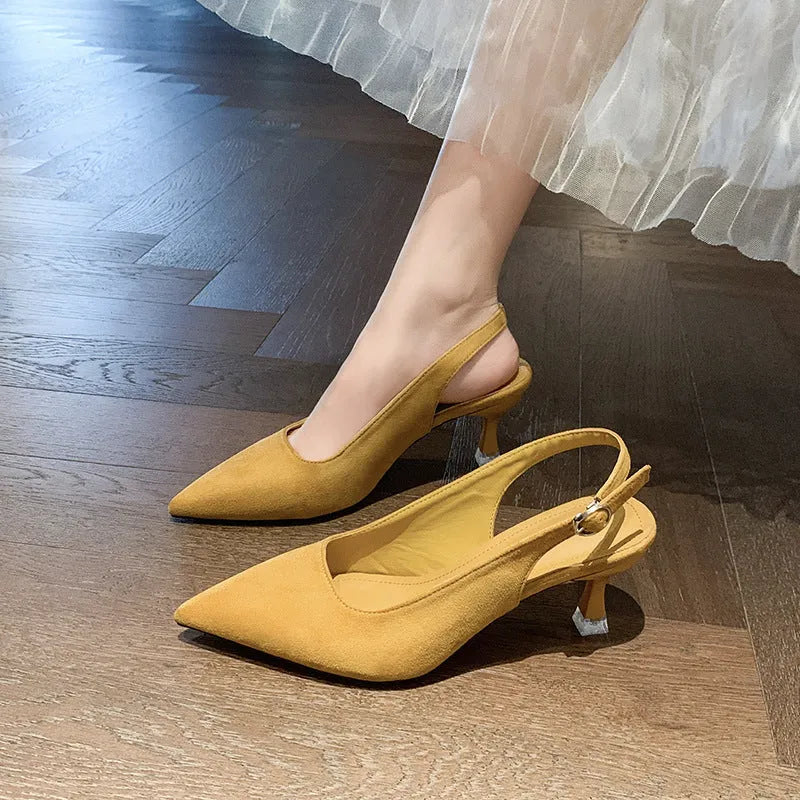 Pointed toe stiletto high heel shoe in suede with a rubber sole.