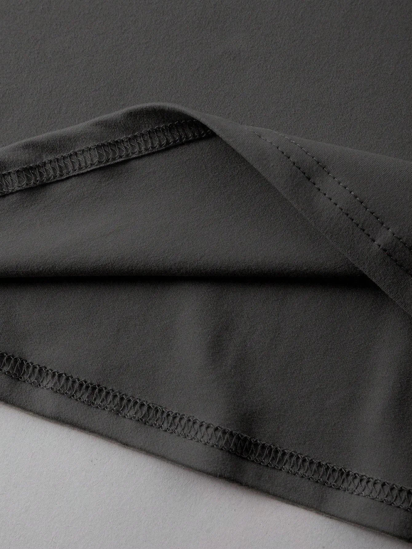 Straight-fit round neck cotton t-shirt in black, green, grey, or orange, shown with short sleeves.