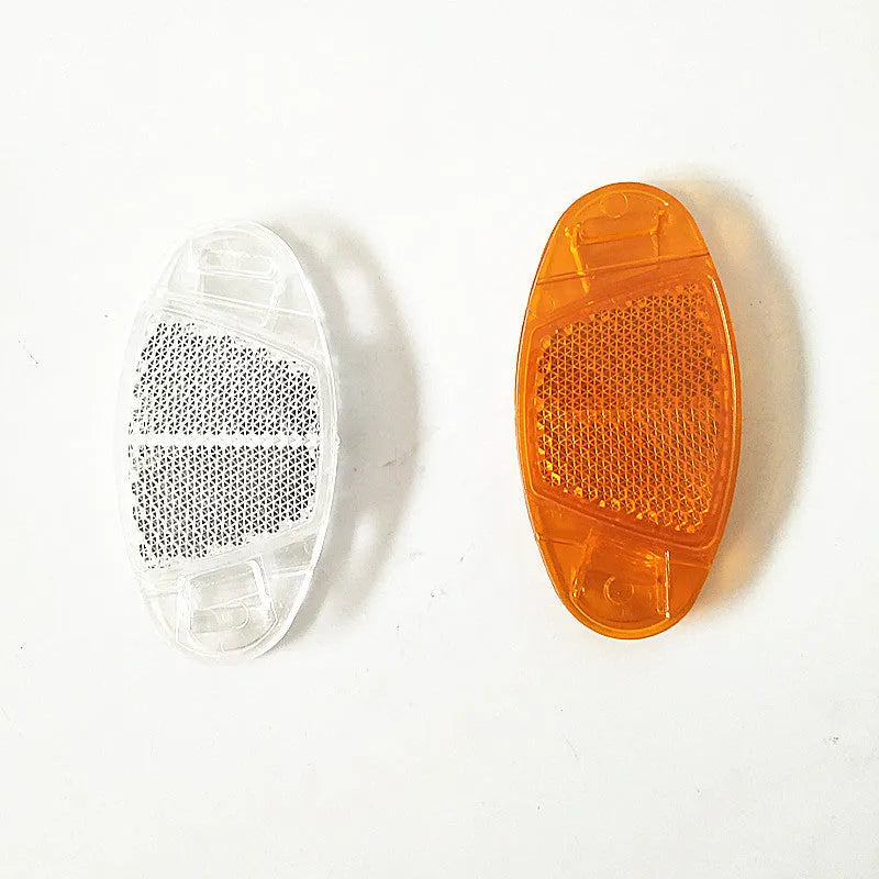 Bicycle spoke reflector set showing four plastic units in yellow colour with dimensions 7.2cm by 3.5cm