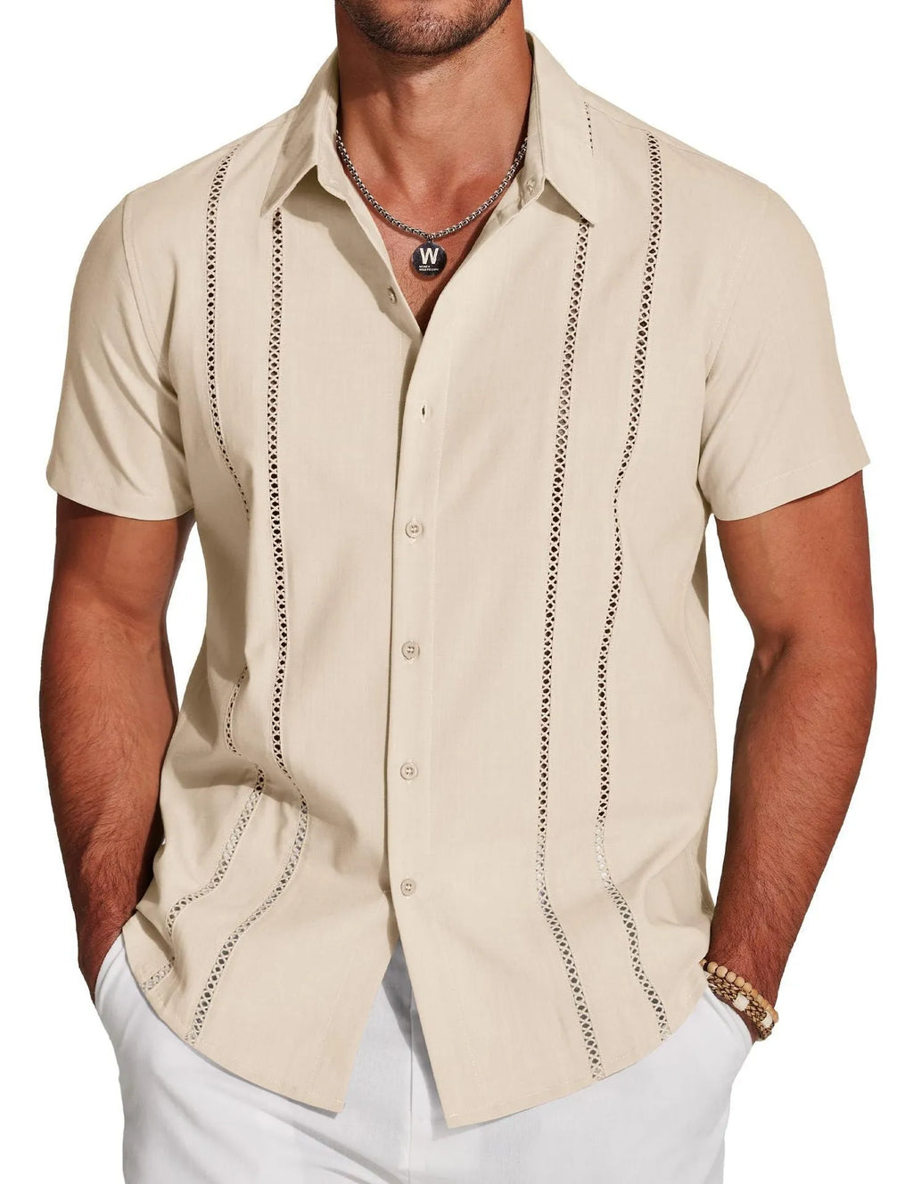 Man wearing a slim fit, short sleeve Hawaiian shirt with a digital print pattern in a casual setting.