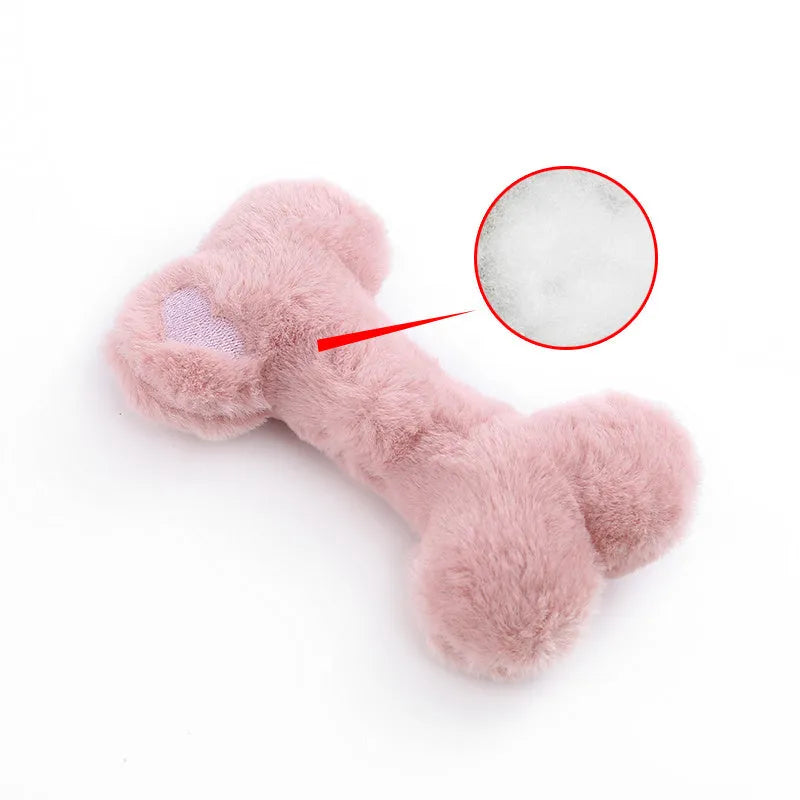 Soft blue plush love bone dog toy with a squeaker for interactive play.