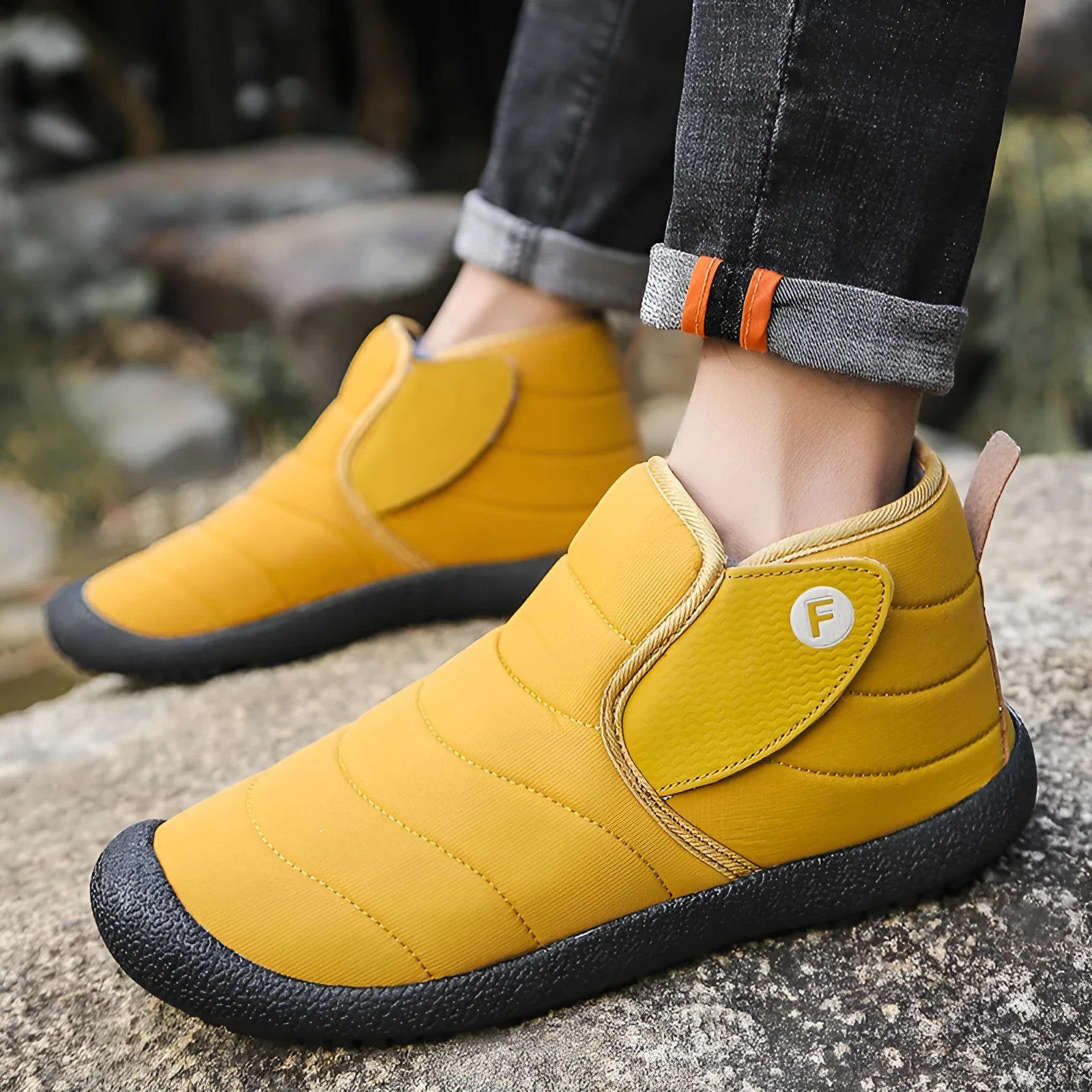 Men's waterproof snow boots with non-slip rubber soles available in black, blue, green, and yellow
