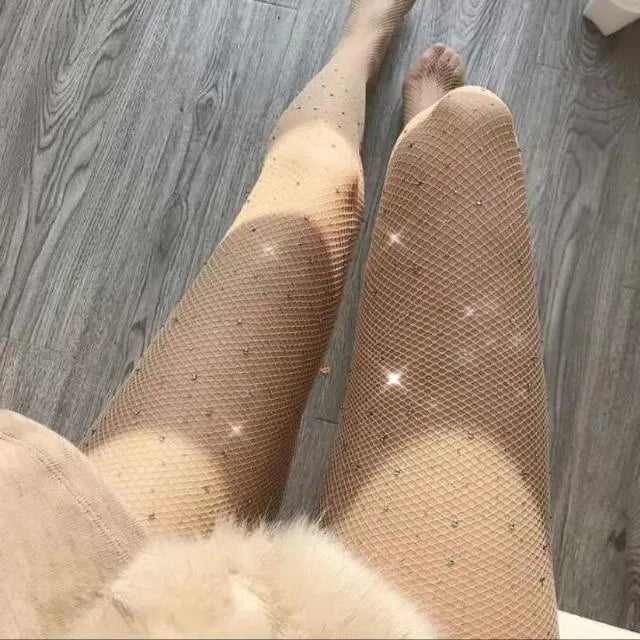 Women's fishnet stockings with diamond mesh pattern in skin colour, black, or white options