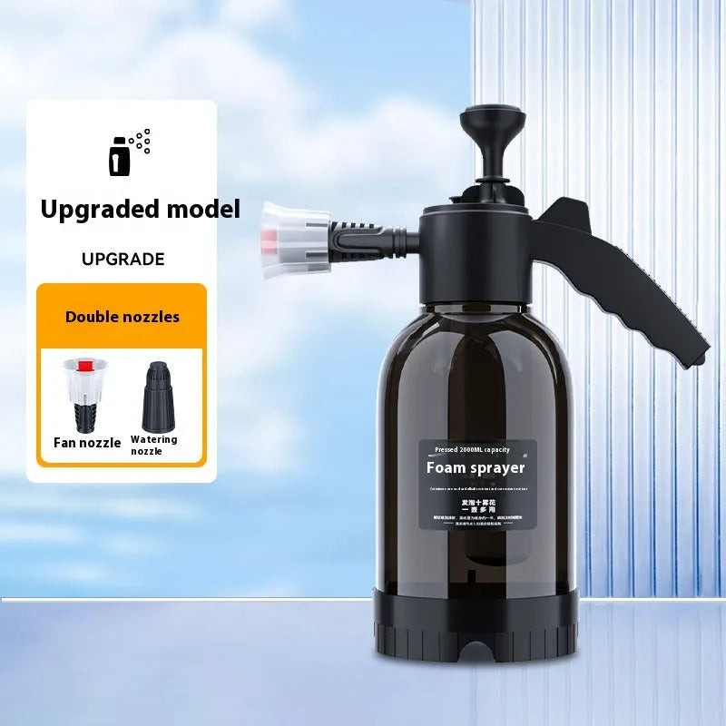Black hand-held sprayer bottle with ergonomic handle and two nozzles for garden watering and car washing