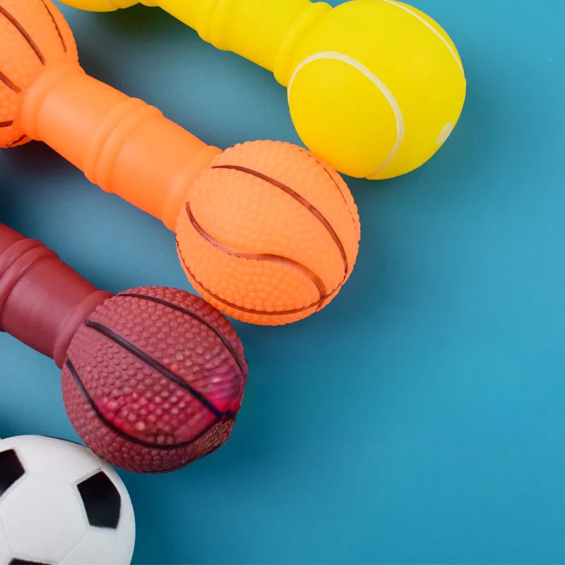 Brown, orange, white, and yellow PVC squeaky football dumbbell shaped dog chew toy