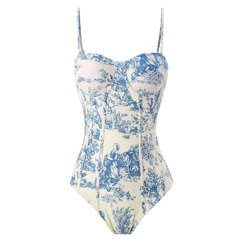 Blue women's one-piece swimsuit with a matching gauze skirt on a size chart background