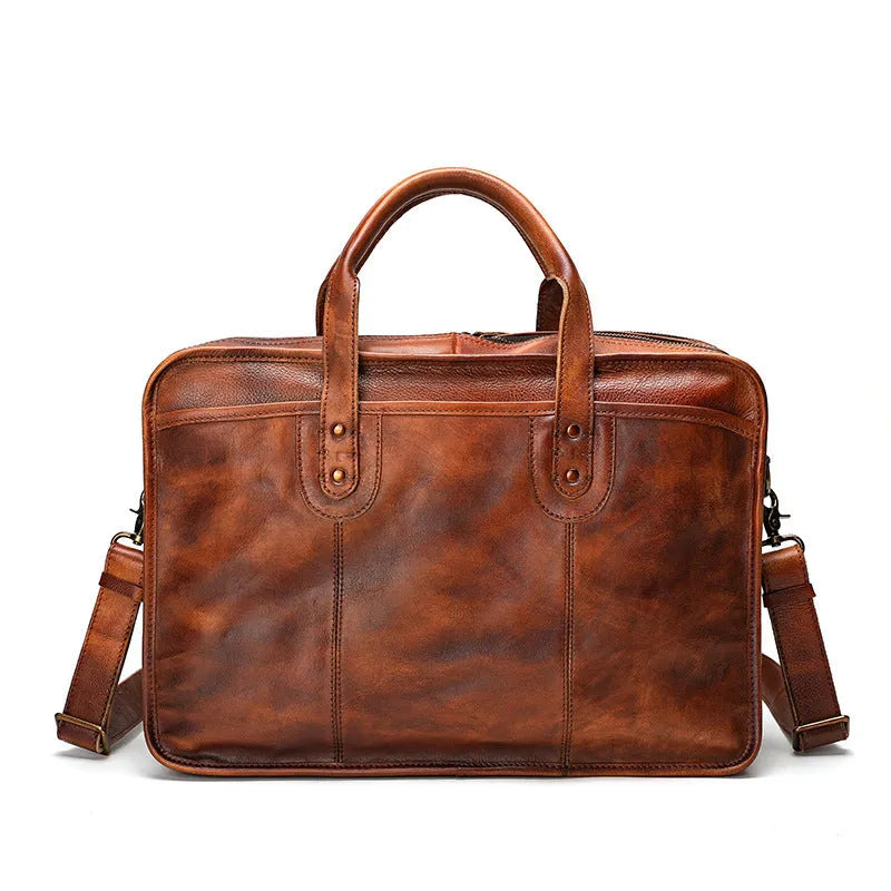 Men's black leather briefcase showing interior organisational pockets and compartments