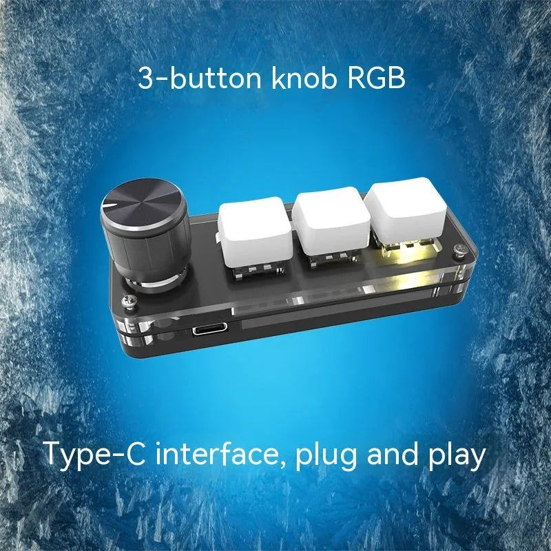 Black RGB backlit mini keyboard with copy and paste keys on desk