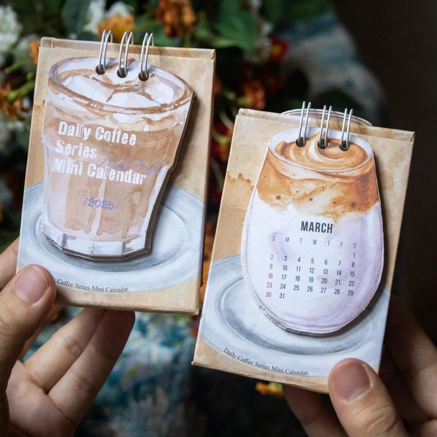 Mini A5 desk calendar 2025 showing one of eight themed designs in simple modern style