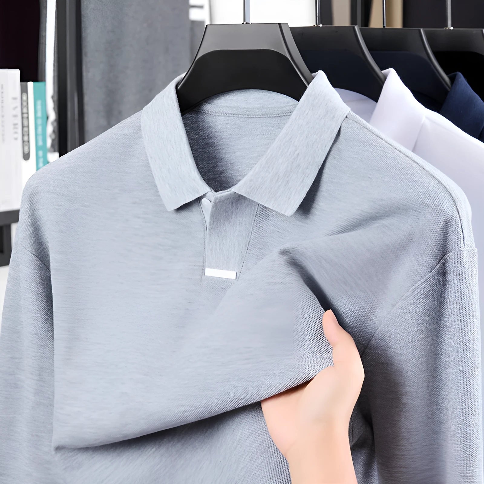 Men's grey asymmetric lapel cotton polo shirt in a loose fit.