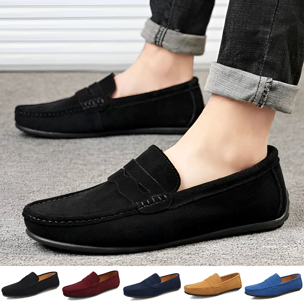 Men's suede slip-on loafers in a solid colour with a round toe and flat rubber sole.