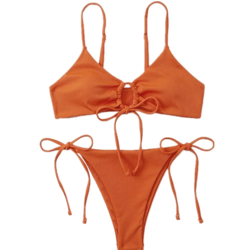 Women's solid colour drawstring bikini set in quick-drying nylon fabric.